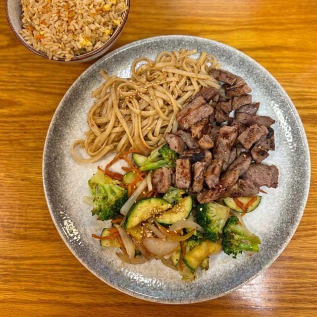 Hibachi Steak with Vegetable Fried Rice and Udon Noodles.